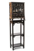 CHINESE BLACK LACQUER & MOTHER OF PEARL INLAID CABINET, c. 1900, fitted two panelled doors and apron