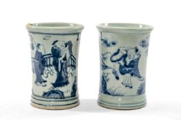 TWO CHINESE BLUE & WHITE BRUSHPOTS, 20th Century, painted with robed figures in a garden beneath