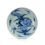 CHINESE BLUE & WHITE 'DRAGON' SAUCER DISH, late Qing dynasty, painted with a large 4-clawed dragon