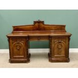 VICTORIAN MAHOGANY PEDESTAL SIDEBOARD having a shaped upper rail-back with carved detail to the