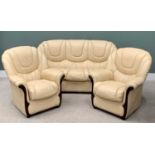MODERN BEIGE LEATHER EFFECT THREE-PIECE SUITE comprising three-seater sofa, 97cms H, 182cms W, 85cms