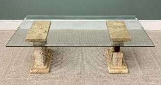 STYLISH MODERN COFFEE TABLE having bevelled edge glass top on antiquities-style stoneware plinths,