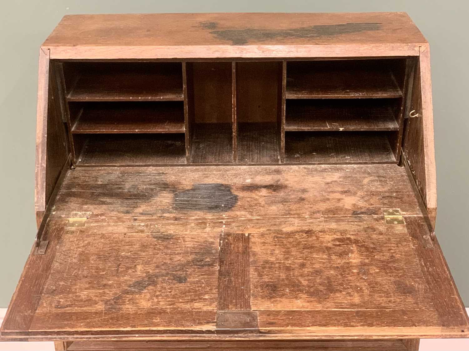 VINTAGE OAK BUREAU having a drop down slope section over three drawers with cast drop handles on - Image 2 of 4