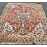EASTERN RUG DECORATED WITH CENTRE DIAMOND of red ground, multi-bordered edge, 370cms L x 265cms W