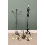 VINTAGE LIGHTING GROUP comprising two wrought iron standard lamps / candleholders, and a brass