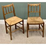 A PAIR OF ANTIQUE RUSH SEATED FARMHOUSE CHAIRS with spindle backs and arched crest rail, 84cms H,