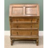 VINTAGE OAK BUREAU having a drop down slope section over three drawers with cast drop handles on