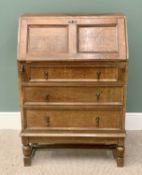 VINTAGE OAK BUREAU having a drop down slope section over three drawers with cast drop handles on