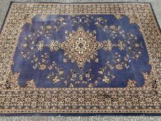 GOOD PERSIAN WOOLEN RUG with blue ground interior, multi bordered with central diamond pattern, 368