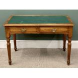 VINTAGE OAK TWO-DRAWER WRITING TABLE with green rexine insert to the top on reeded and turned