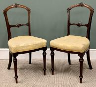 A PAIR OF ANTIQUE WALNUT PARLOUR CHAIRS with carved leaf detail and leaf pattern gold upholstery
