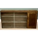 POLISHED OAK BOOKCASE CUPBOARD with sliding glass doors and end cupboard, 96cms H, 182cms W, 23cms
