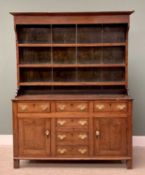 OAK WELSH DRESSER North Wales circa 1860, wide backboards to a three-shelf rack, the base with a T