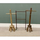 TWO VINTAGE TREEN WASH DOLLIES together with a mahogany towel rail