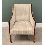 REGENCY-STYLE EDWARDIAN UPHOLSTERED EASY CHAIR in button back striped upholstery, on tapered front