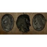 A PAIR OF BRONZE OVAL RELIEF MEDALLIONS classical figure head profiles in walnut frames with