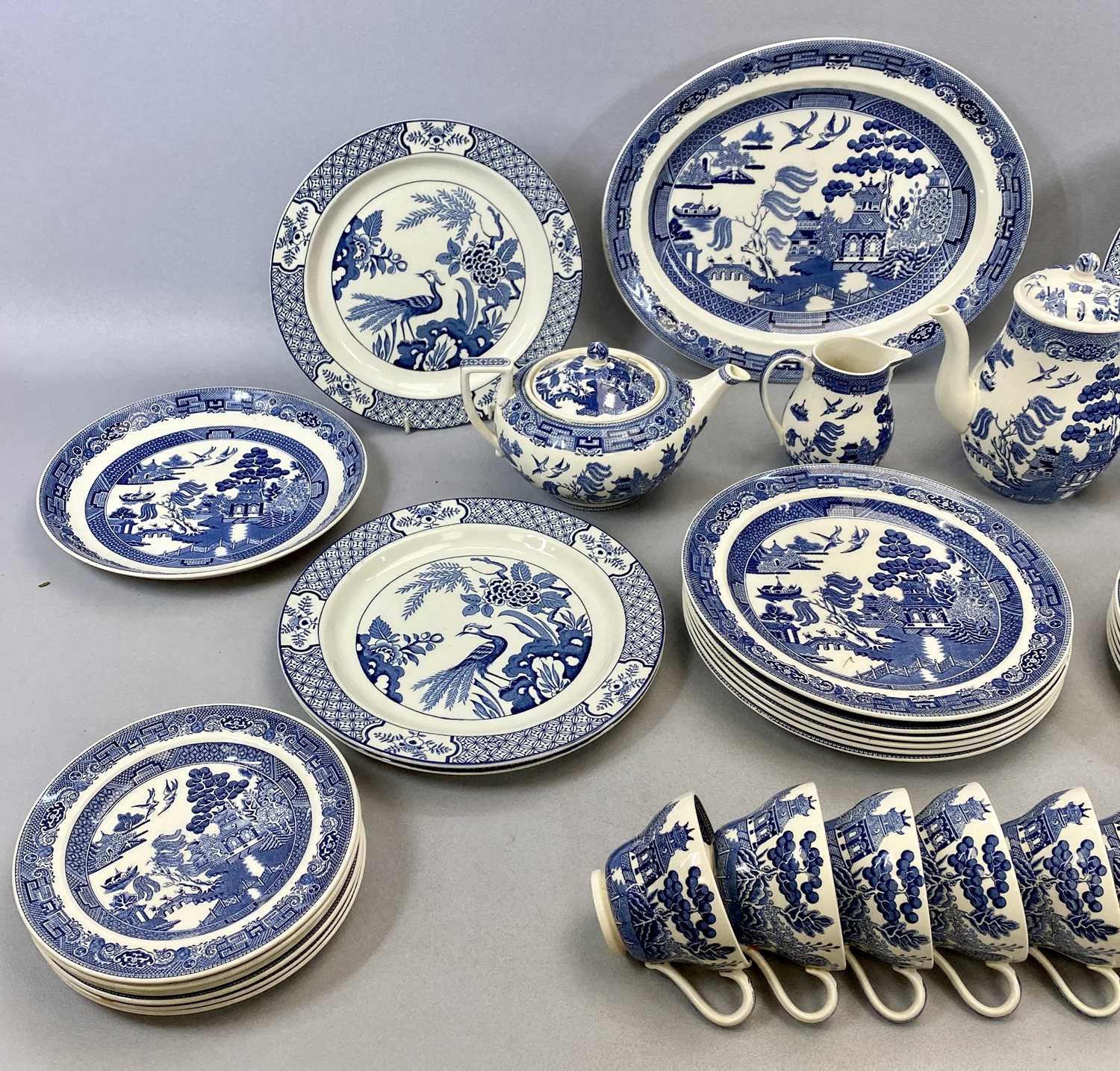 WEDGWOOD 'WILLOW PATTERN' BLUE & WHITE TABLEWARE, 6 x circular plates, 23.5cms diam., 1 x oval - Image 2 of 3