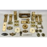 BRASS DOOR FURNITURE, including knobs with back plates, post box with knocker, furniture handles