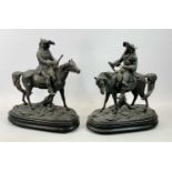 SPELTER FIGURES, A PAIR - late 19th Century, cavaliers on horseback, on oval wooden plinths, 39cms
