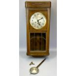 EDWARDIAN MAHOGANY CASED WALL CLOCK, the door glazed with bevelled glass panels to the lower