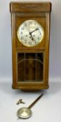 EDWARDIAN MAHOGANY CASED WALL CLOCK, the door glazed with bevelled glass panels to the lower