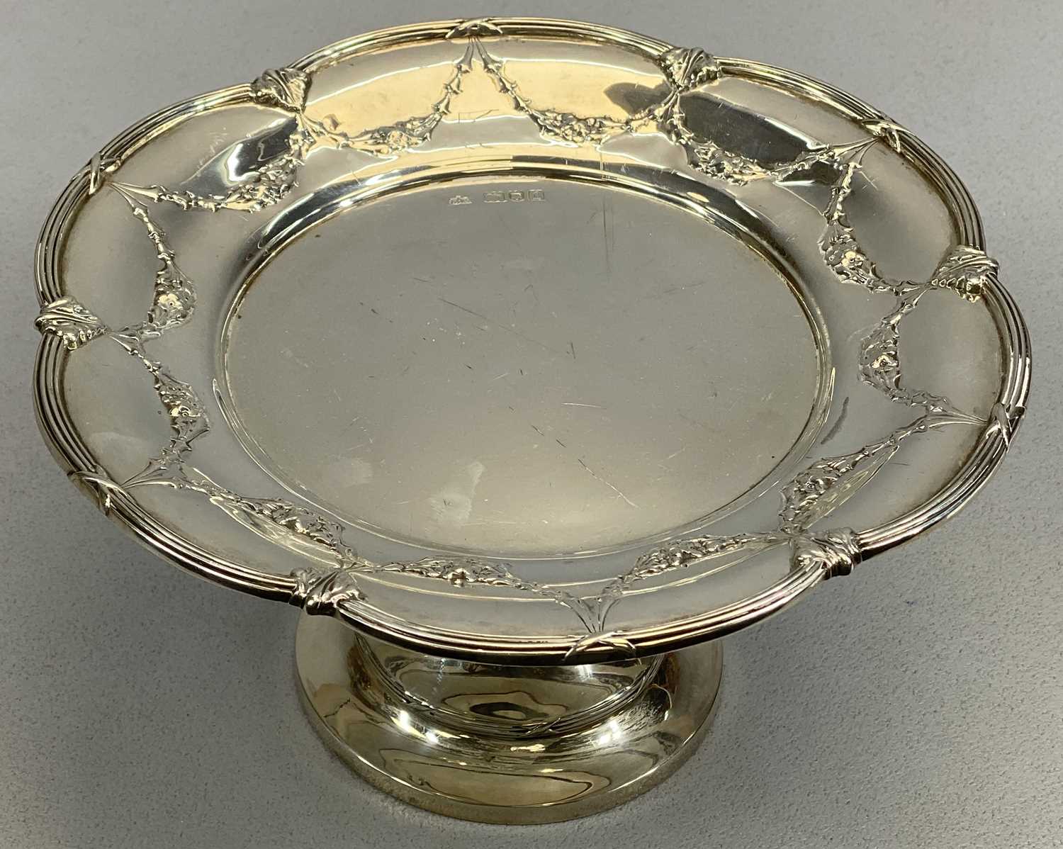 SILVER TAZZA the lobed outer rim with bound reeded details and an inner band of embossed floral - Image 3 of 4