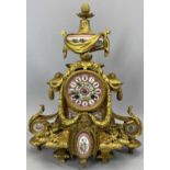 FRENCH GILT BRONZE & PORCELAIN MANTEL CLOCK, late 19th Century, the case cast with swags, flowers