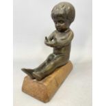 'HAILWARE' BRONZE FIGURE OF A SEATED CHILD with cupped hands, stamped 'Hailware', on rectangular oak