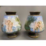 CONTINENTAL VASES, A SHORT STEMMED PAIR, with infants playing in a river, 15cms H