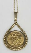 ELIZABETH II GOLD HALF SOVEREIGN 1982, in a 9ct pendant mount on a fine double link 9ct necklace,