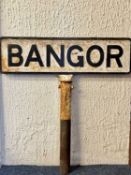 VICTORIAN CAST IRON DOUBLE SIDED RAILWAY SIGN 'BANGOR', 93 x 26cms, mounted on a cast iron post,