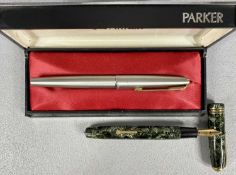 CONWAY STEWART 58 VINTAGE FOUNTAIN PEN, green marbled, the cap with gold coloured clip and bands,