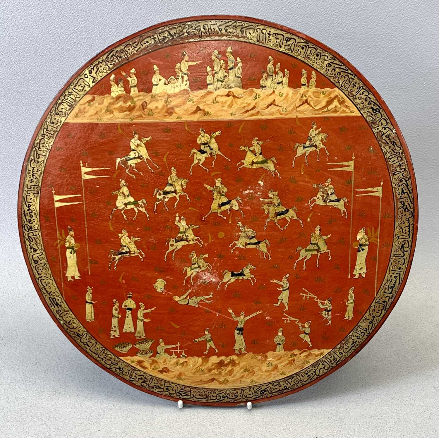 NORTH INDIAN / KASHMIR PAPIER MACHE CIRCULAR PLAQUES, A PAIR, decorated with polo players on red - Image 4 of 4