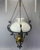 HANGING OIL LAMP late 19th Century, Lampe Veritas brass reservoir with single burner, scrolled