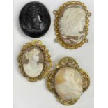 VICTORIAN PINCHBECK & ONE OTHER SHELL CARVED CAMEO BROOCHES, and a carved jet cameo brooch, the