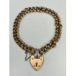 9CT GOLD CURBLINK BRACELET WITH PADLOCK CLASP & SAFETY CHAIN, date marked Birmingham 1906, closed