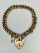 9CT GOLD CURBLINK BRACELET WITH PADLOCK CLASP & SAFETY CHAIN, date marked Birmingham 1906, closed