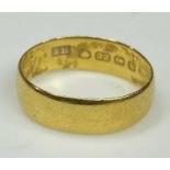 22CT GOLD WEDDING BAND date marked Birmingham 1907, size L, 3.9g