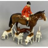 BESWICK HUNTSMAN WEARING RED COAT ON BAY HORSE, gloss, model 1501, four Beswick hounds in various