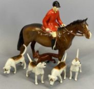 BESWICK HUNTSMAN WEARING RED COAT ON BAY HORSE, gloss, model 1501, four Beswick hounds in various