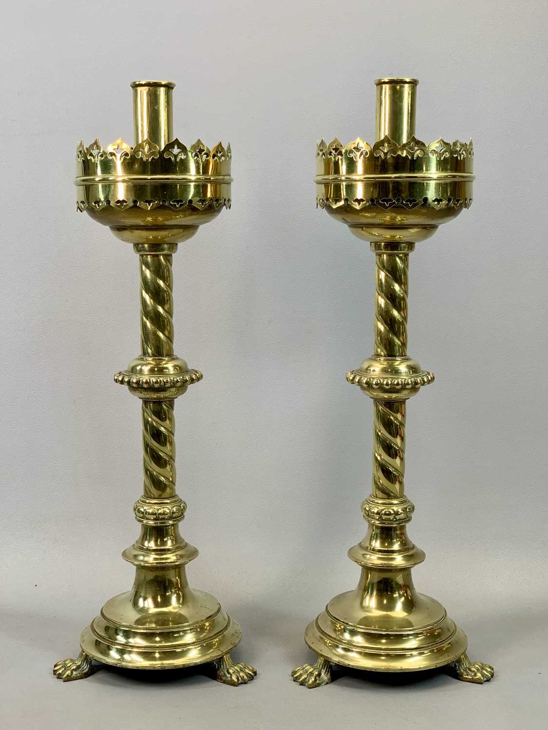 A PAIR OF VICTORIAN GOTHIC REVIVAL BRASS ALTAR CANDLESTICKS substantial & highly decorative with - Image 2 of 2