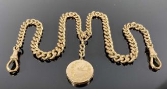 9CT GOLD CURB LINK DOUBLE ALBERT with a 9ct gold back and front circular locket attached, all