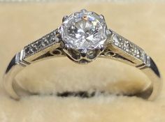 18CT WHITE GOLD SOLITAIRE DIAMOND RING coronet mounted, 0.33ct round brilliant set within a closed