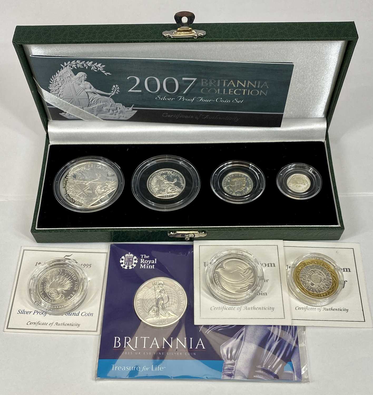 EIGHT ROYAL MINT SILVER PROOF COINS COLLECTION to include a 2007 silver proof four-coin set,