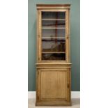 VICTORIAN OAK BOOKCASE CUPBOARD OF SLIM PROPORTIONS, having a single glazed door top with adjustable