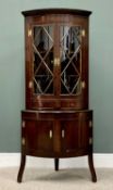 GEORGIAN-STYLE REPRODUCTION MAHOGANY TWO-PIECE BOWFRONT STANDING CORNER CUPBOARD, having a twin door