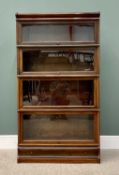 GLOBE-WERNICKE MAHOGANY FOUR-SECTION STACKING BOOKCASE with top cover and lower single drawer