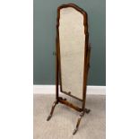 VINTAGE WALNUT CHEVAL DRESSING MIRROR, having a shaped top mirror frame and capped supports on
