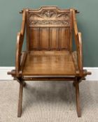 GOTHIC-STYLE CARVED OAK GLASTONBURY TYPE ARMCHAIR, having linenfold and other details carved to