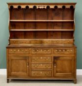 GOOD NORTH WALES OAK DRESSER circa 1840, having a decorative apron to the stepped cornice, shaped